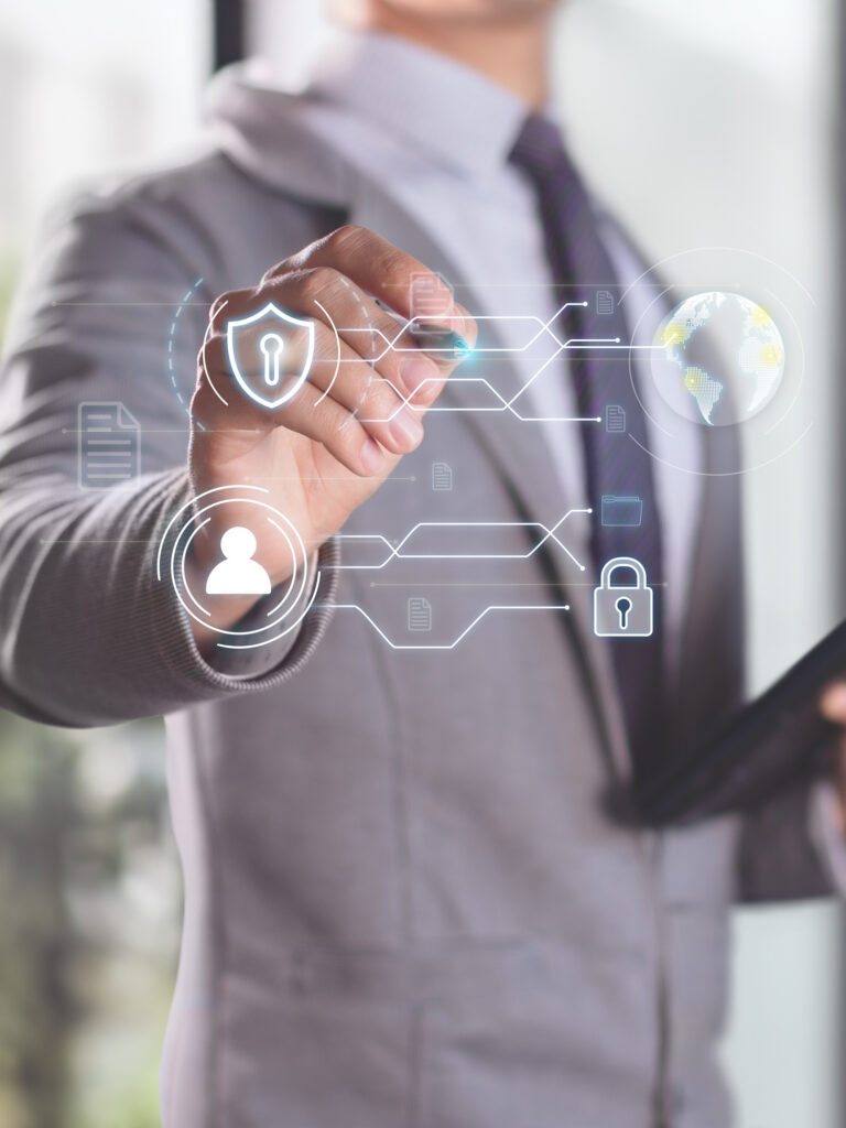 Businessman Interacting with Digital Security Interface on Tablet in Modern Office