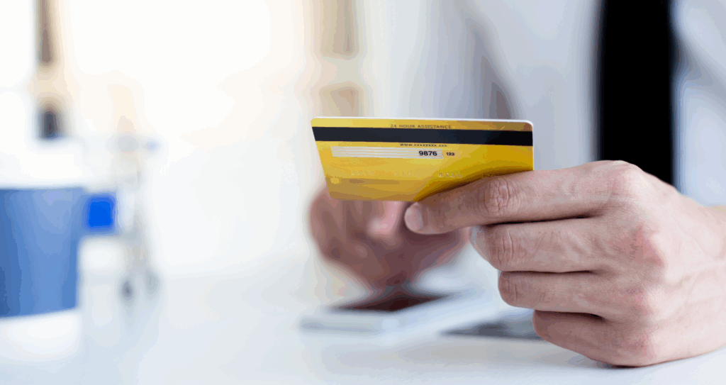 Businessman use mobile phones online with a credit card to buy products online through application,Online shopping or Internet technology concept.