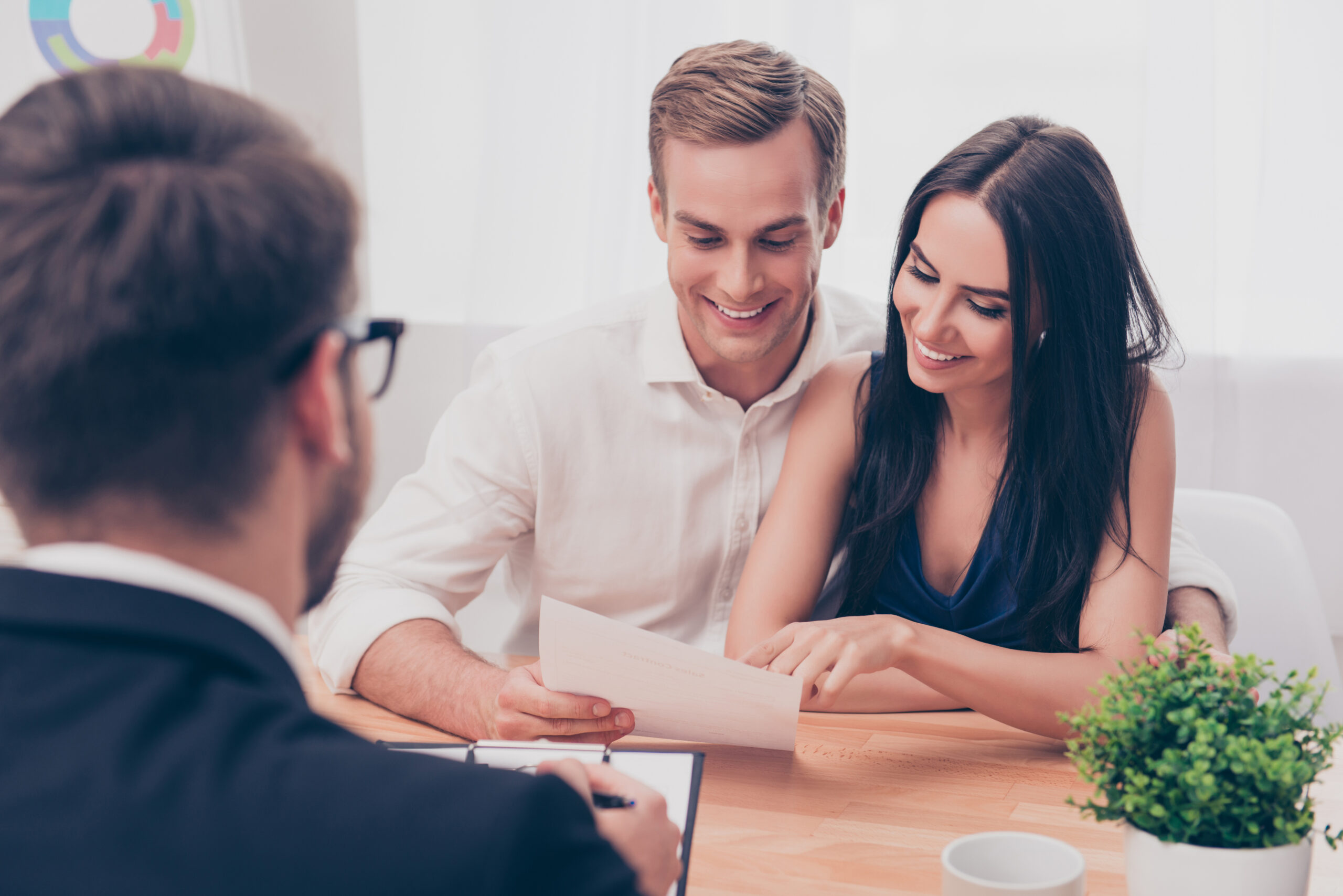 Businessman giving consultation to couple