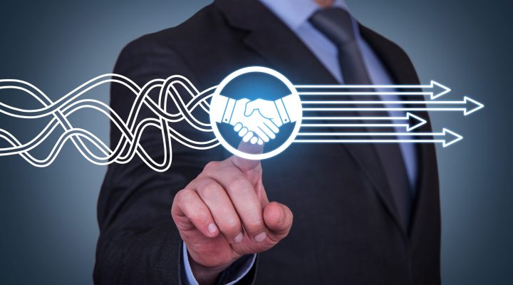 Solution Concept with Handshake on Touch Screen, business alignment.