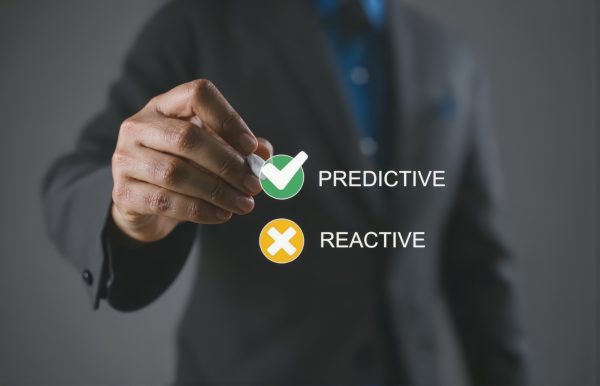 Predictive or reactive solution initiative concept. Person ticking a checkbox with the text predictive.